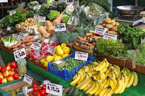 Fruits and vegetables at farmers market stall