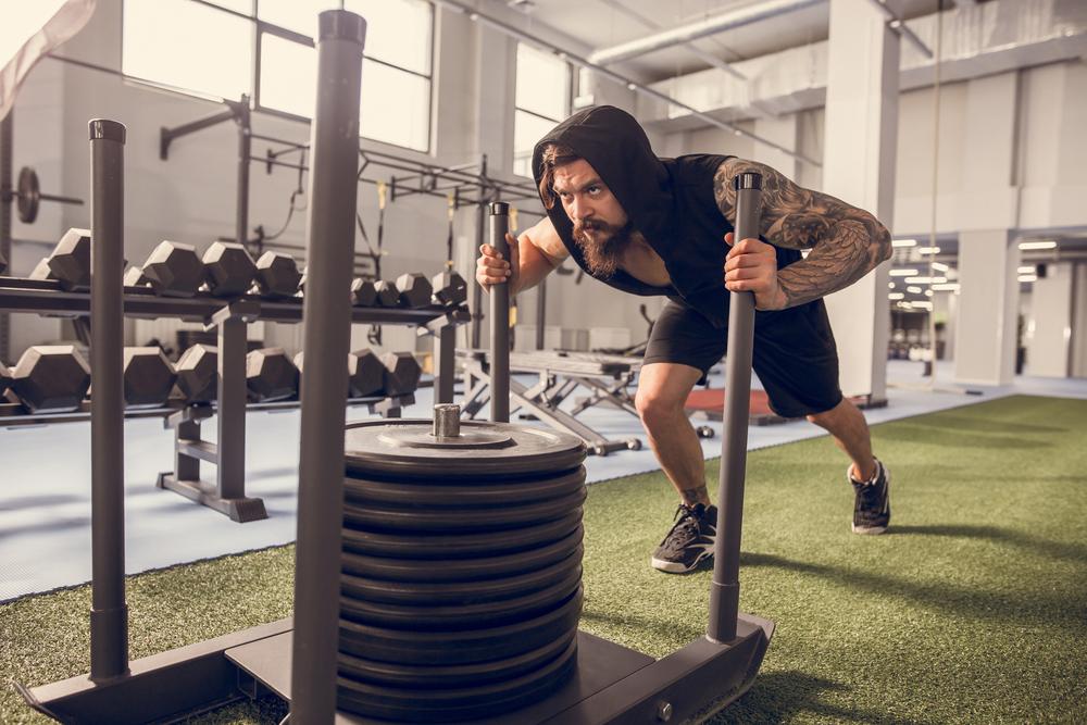 Iron sled with weight in the gym